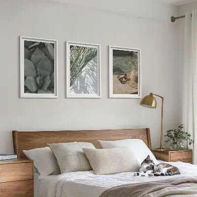Tavelset med tropiska växter för placering ovanför soffan