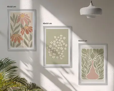 Tavelset ovanför soffa med blommiga bohemiska mönster