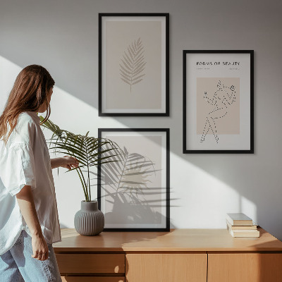 Tavelset ovanför soffa En samling minimalistiska former