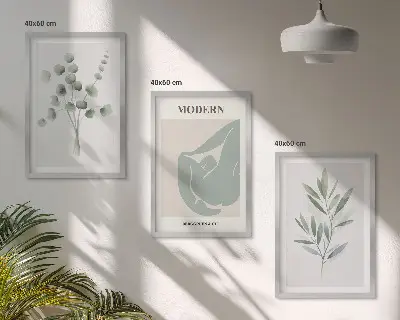 Tavelset med växtmotiv grönt set ovanför soffa