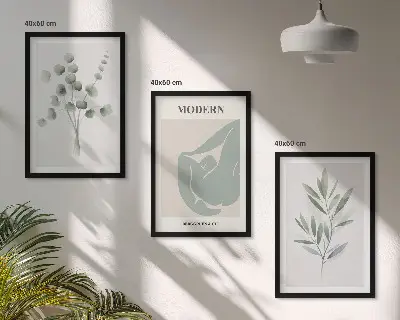 Tavelset med växtmotiv grönt set ovanför soffa