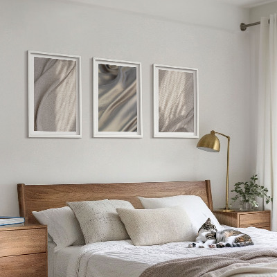 Set om 3 tavlor Naturliga boho-tyger närbild
