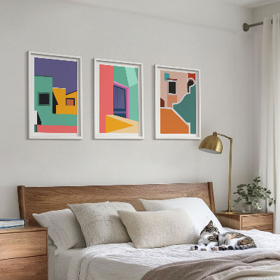 Tavelset ovanför soffa Färgglada illustrationer av staden
