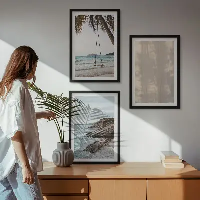 Sommarutsikt över sanden och havet set om 3 tavlor