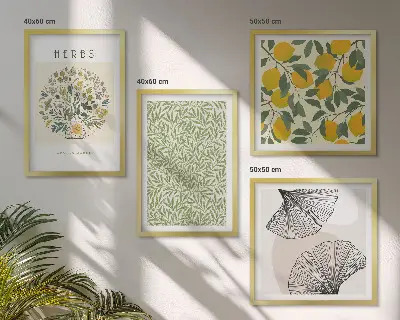 Tavelvägg ovanför soffa med motiv av citronörter och blad