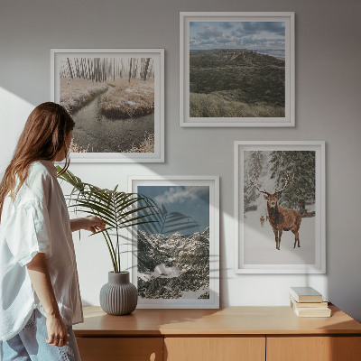 Tavelvägg med 4 tavlor Berg snö hjort skog landskap
