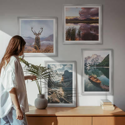 Set om 4 tavlor Bergsjö båt solnedgång hjort