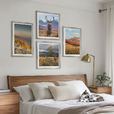 Tavelvägg ovanför soffa Bergslandskap hjortgräs
