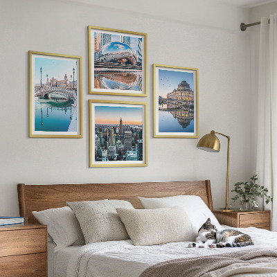 Tavelvägg med 4 tavlor Arkitektur av städer vid vatten