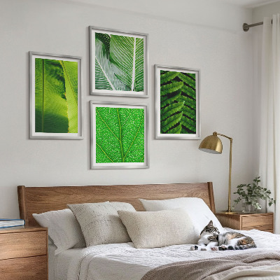Tavelvägg ovanför soffa Närbild av tropiska löv