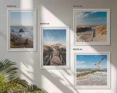Tavelvägg med 4 tavlor med motiv av strand, vågor, himmel och pir