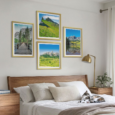 Tavelvägg med 4 tavlor Gröna kullar med ett slott