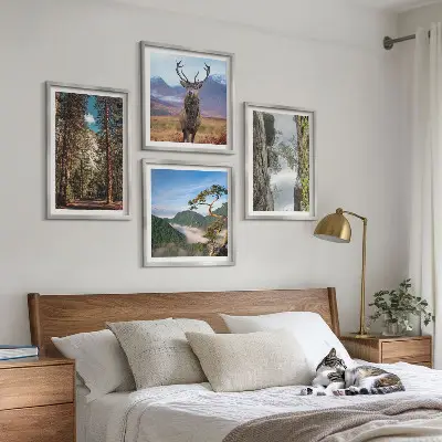Tavelvägg med 4 tavlor skog, berg och rådjur i naturmotiv