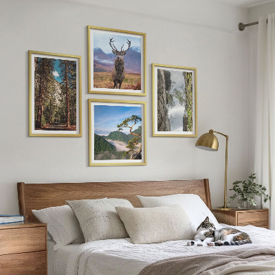 Tavelvägg med 4 tavlor väg skog berg rådjur natur
