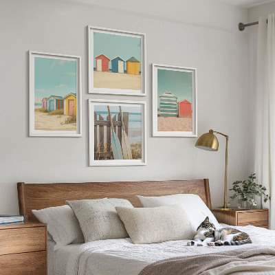 Set om 4 tavlor Färgglada strandhus
