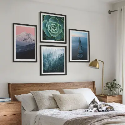 Set med 4 tavlor med motiv av berg, rosa himmel och vatten