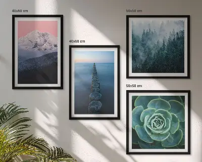Set med 4 tavlor med motiv av berg, rosa himmel och vatten
