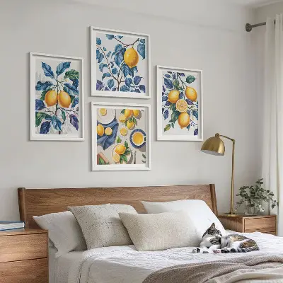 Tavelvägg med 4 tavlor med motiv av citrongrenar med blå blad