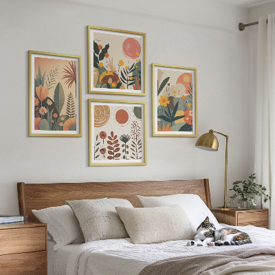 Tavelvägg ovanför soffa Boho växtmönster med varma färger