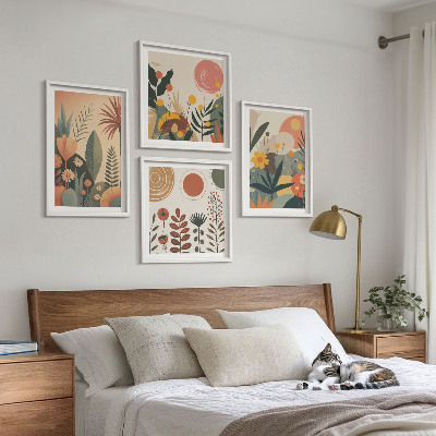 Tavelvägg ovanför soffa Boho växtmönster med varma färger