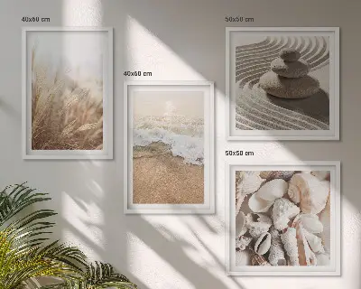 Tavelvägg med 4 tavlor med strandmotiv av snäckor och vågor