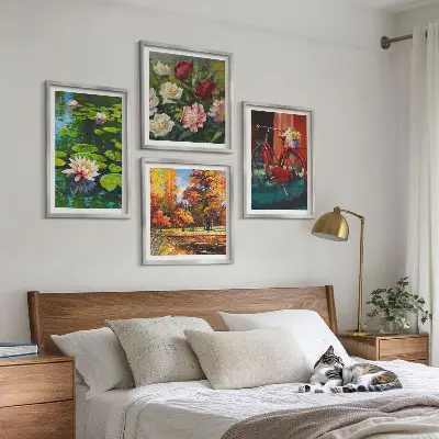Tavelvägg med 4 tavlor motiv med höstfärger och näckrosdamm