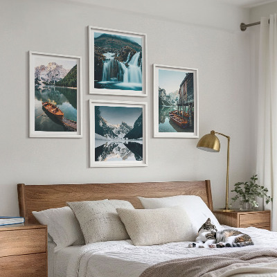 Tavelvägg med 4 tavlor Bergsjöar båtar reflektion