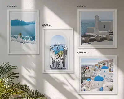 Tavelvägg med motiv av byggnader vid Vita havet i Grekland tavelvägg ovanför soffa