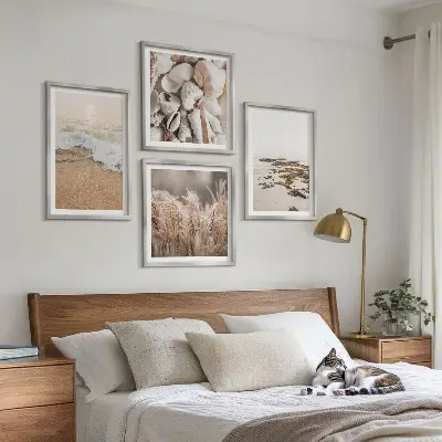 Tavelvägg med 4 tavlor strandgräs, vågor och stenar i boho-stil