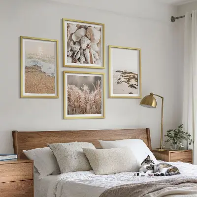 Tavelvägg med 4 tavlor strandgräs, vågor och stenar i boho-stil