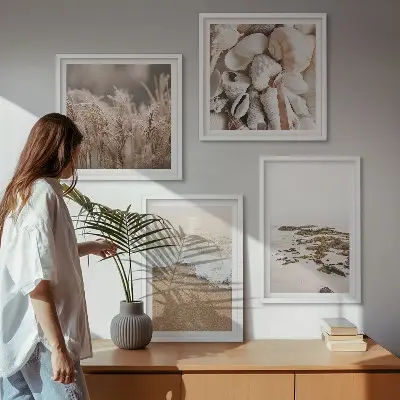 Tavelvägg med 4 tavlor strandgräs, vågor och stenar i boho-stil