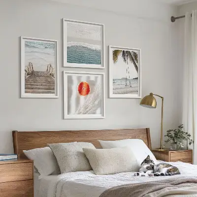 Tavelvägg med 4 tavlor med motiv av strandens trätrappa