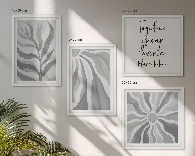 Blommig postersats för tavelvägg med pastellfärgade illustrationer ovanför soffan