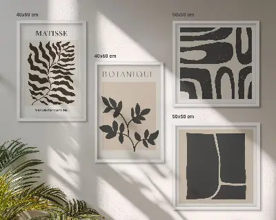 Minimalistiska växtposters tavelvägg ovanför soffan