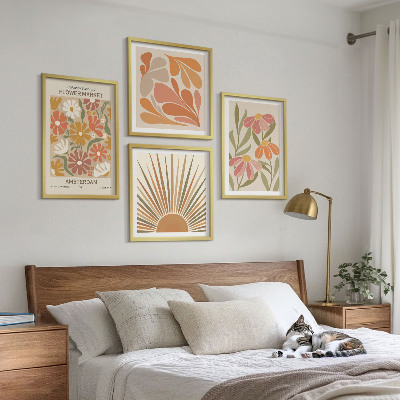 Tavelvägg med 4 tavlor Pastellfärgade solblommor