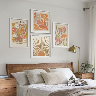 Tavelvägg med 4 tavlor Pastellfärgade solblommor