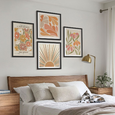 Tavelvägg med 4 tavlor Pastellfärgade solblommor