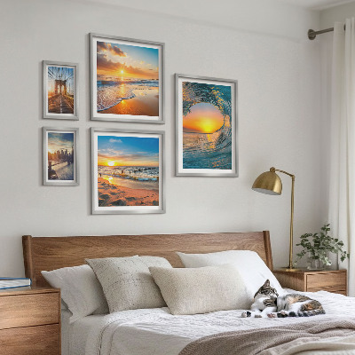 Tavelvägg med 5 tavlor Havssolnedgångar stadsbroar