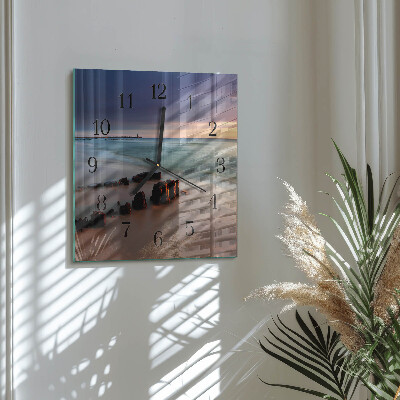 Glasklocka fyrkant strand havet